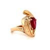 pear shape pink tourmaline (rubelite) and diamond ring in 14 kt yellow gold.
