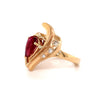 pear shape pink tourmaline (rubelite) and diamond ring in 14 kt yellow gold.