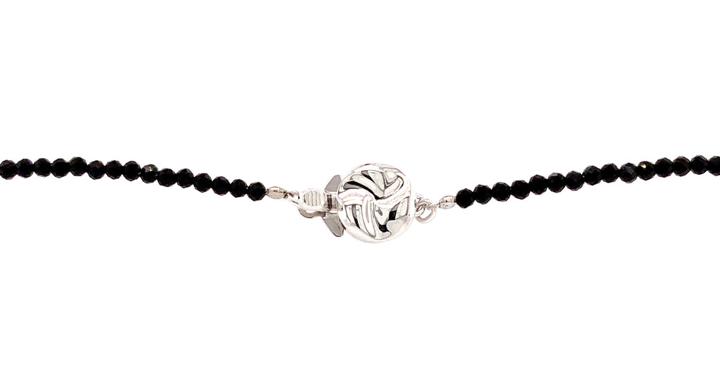  cultured tahitian black pearl and black spinal faceted beads 28 inch necklace.