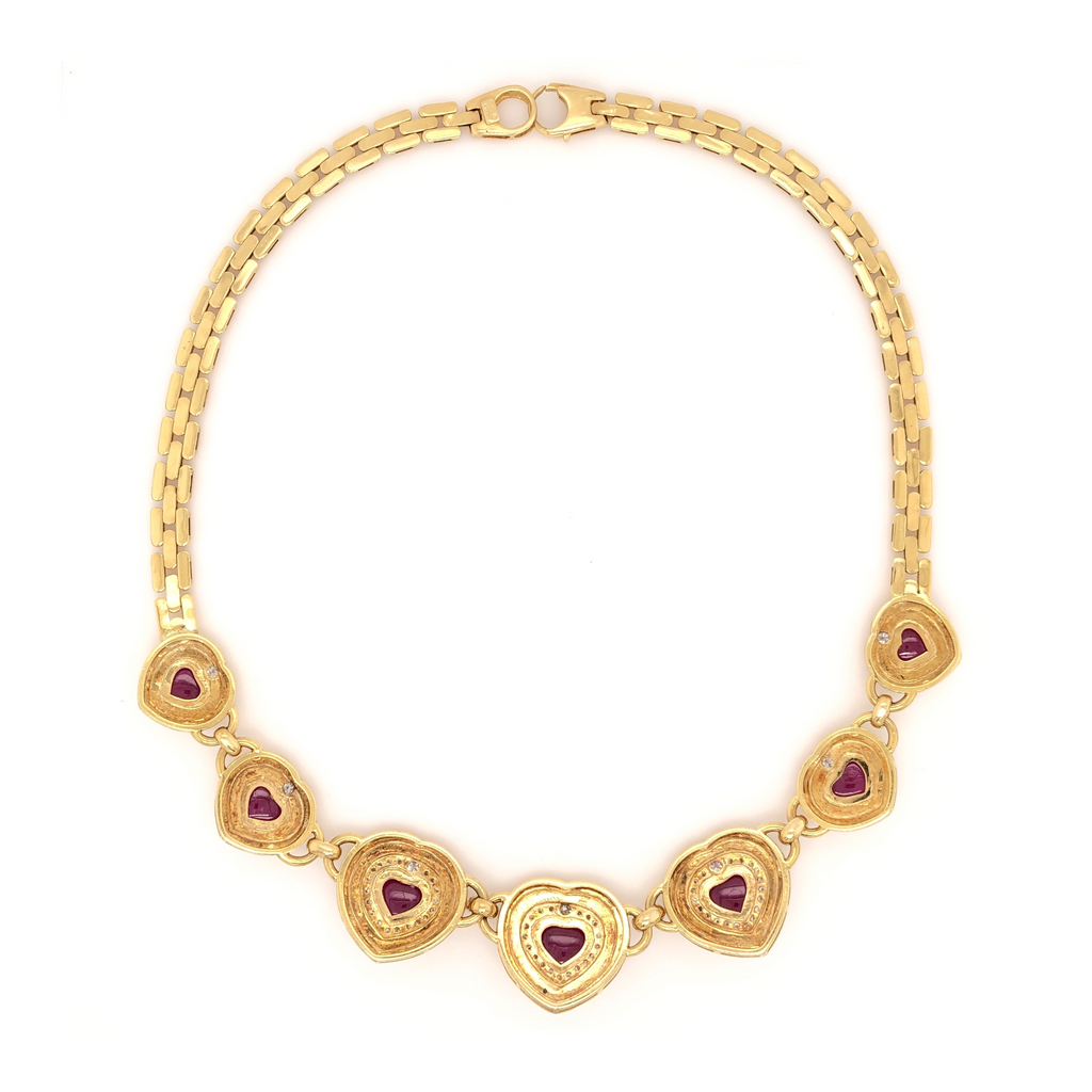 seven hearts shaped ruby and diamond necklace 18k yellow gold panther link chain.