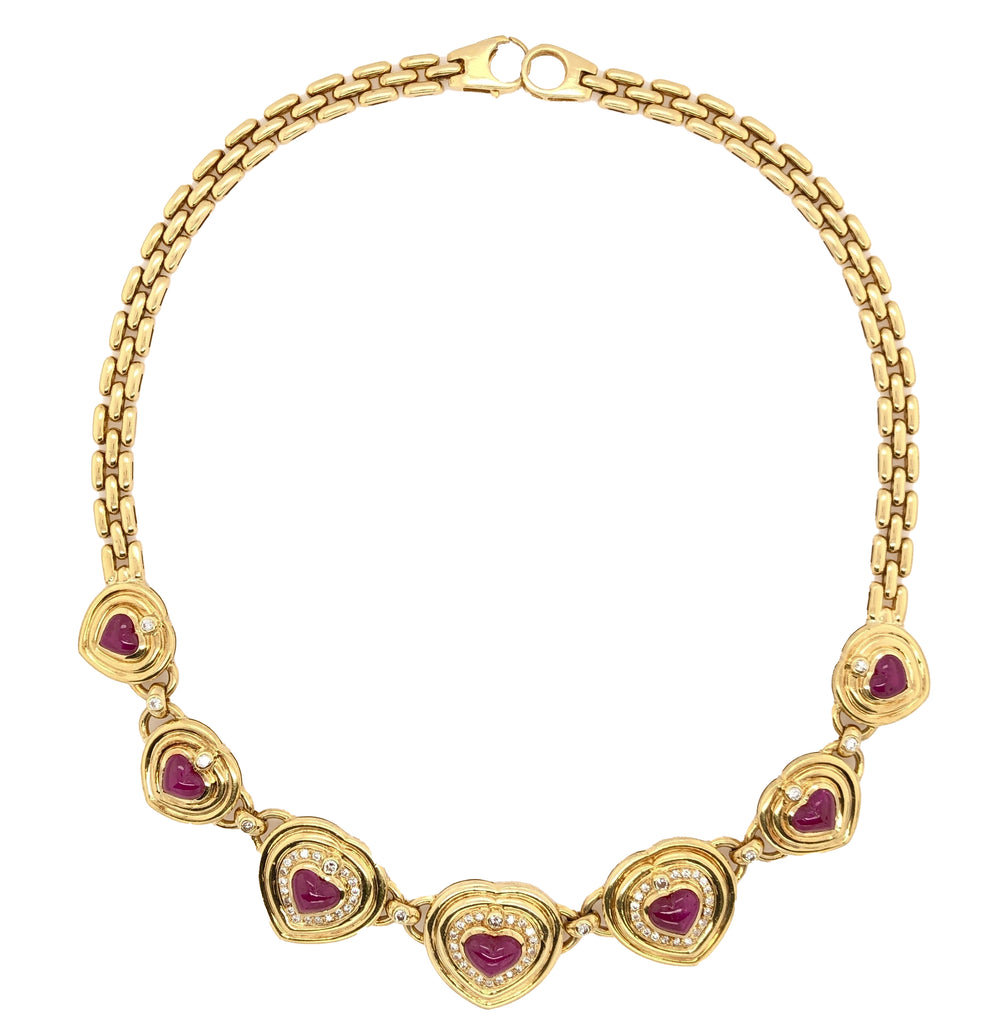 seven hearts shaped ruby and diamond necklace 18k yellow gold panther link chain.