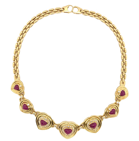 seven hearts shaped ruby and diamond necklace 18k yellow gold panther link chain.