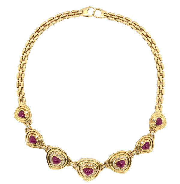 seven hearts shaped ruby and diamond necklace 18k yellow gold panther link chain.