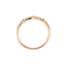 large and small round brilliant cut diamonds 0.20 ctw bezel set band 14k rose gold
