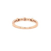large and small round brilliant cut diamonds 0.20 ctw bezel set band 14k rose gold