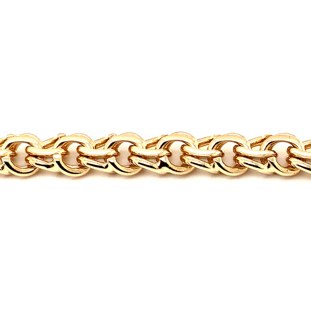vintage 14 kt yellow gold charm bracelet 9mm wide 7 inches in length